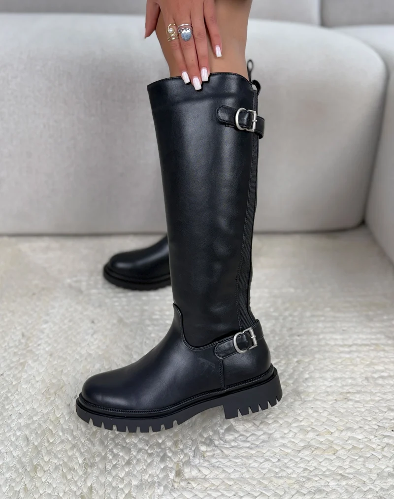Bottes femme noires tendance à boucles argentées et semelle crantée