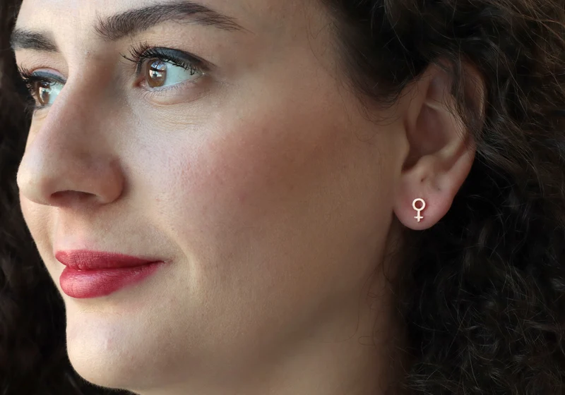 Boucles d’oreilles du symbole féminin