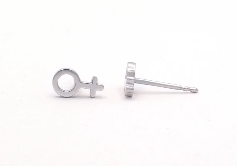 Boucles d’oreilles du symbole féminin