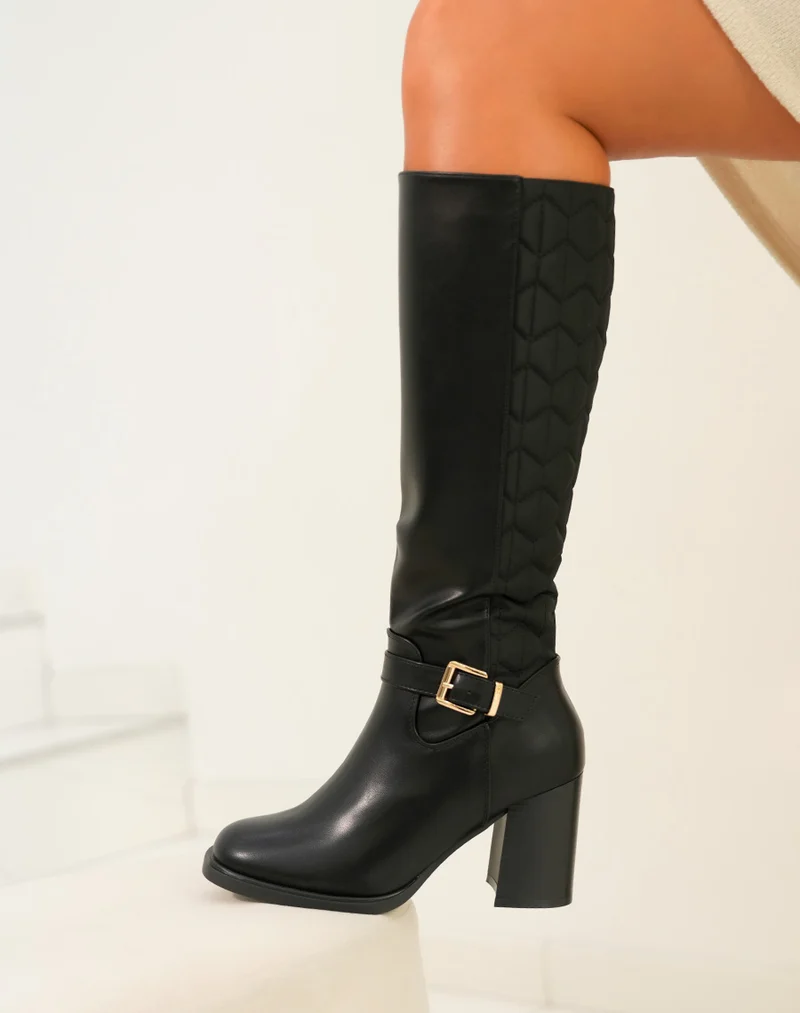 Bottes Noires Matelassées : Confort Luxueux et Détails Précieux