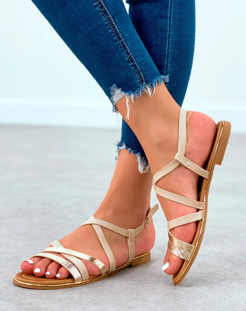 Sandales plates bi-couleur beige et dorée à lanière entrecroisées