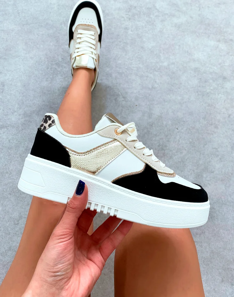 Baskets femme bi-couleurs noires à empiècements et détail léopard