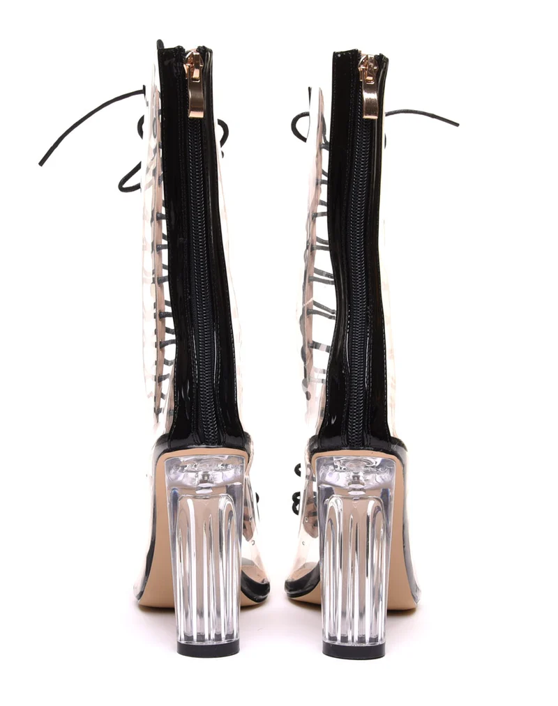 Bottes hautes noires à talons transparents