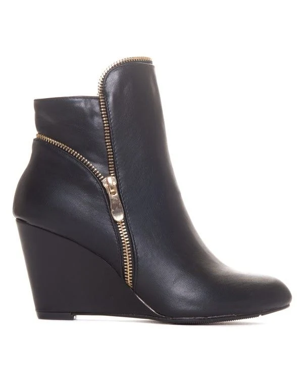 Bottines compensées noires à fermeture éclaire