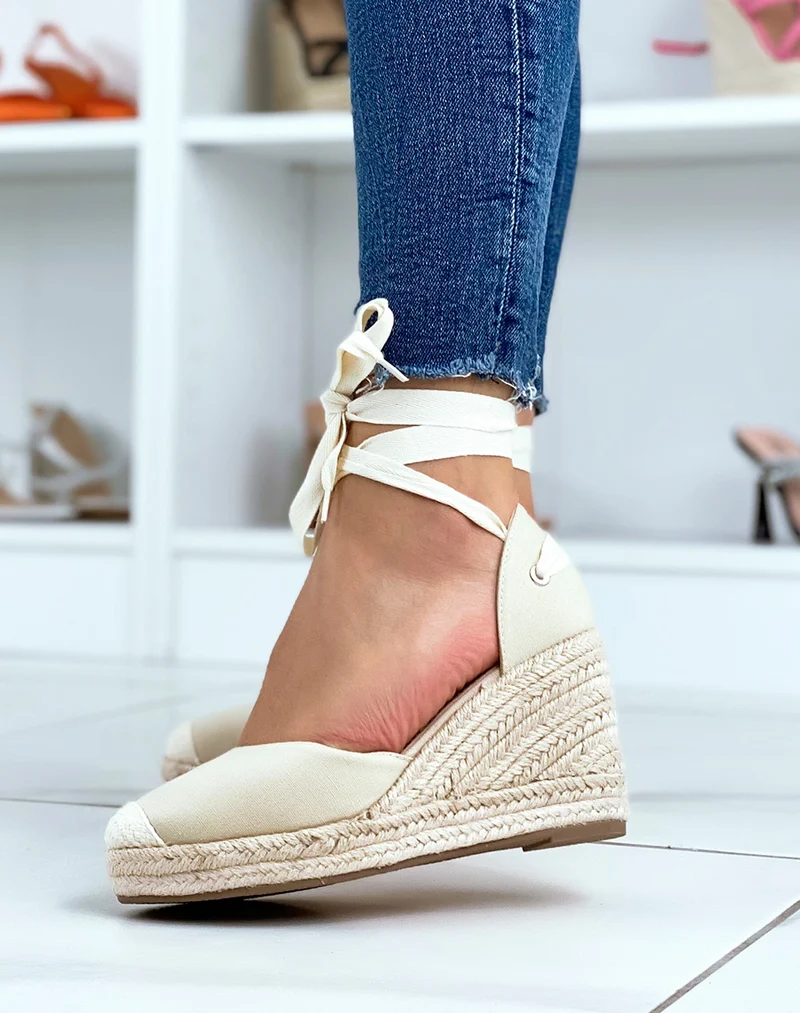Espadrilles à talons compensés en toile beige à rubans