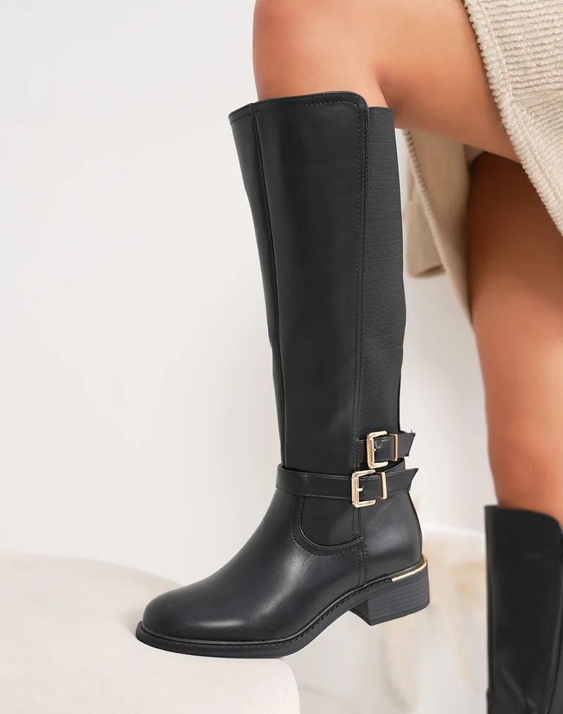 Bottes noires à élastique avec double boucle dorée et liseré – intérieur fourré