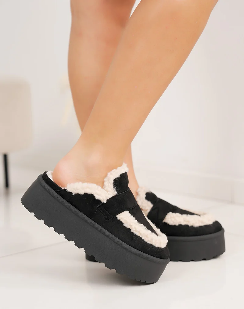 Mules femme noires tendance en suédine avec fourrure blanche et semelle plateforme