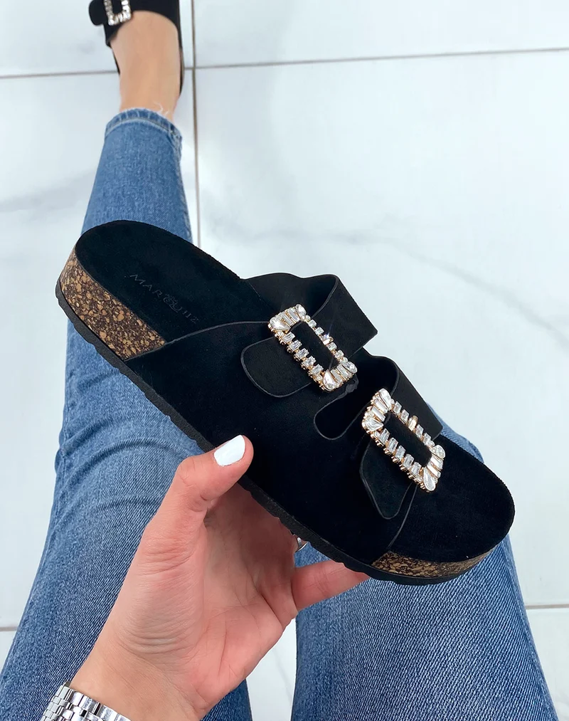 Mules noires à lanières épaisses et bijoux à strass