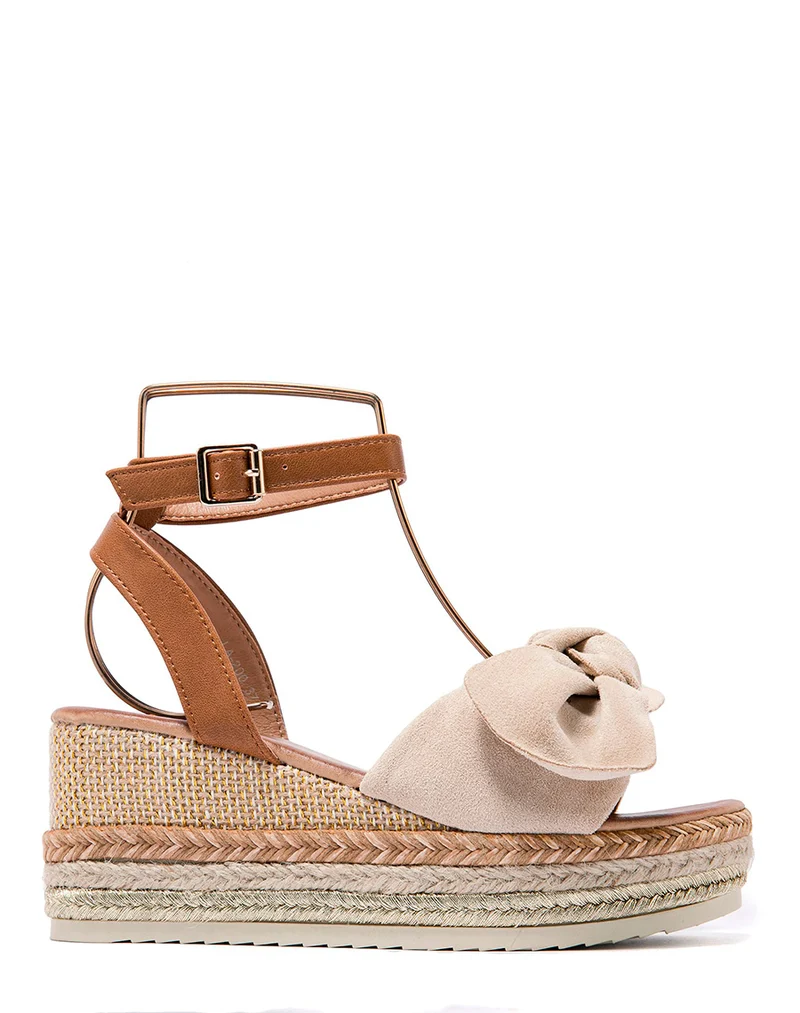 Sandales compensées à noeud en suédine beige et talon en toile de jute coloré