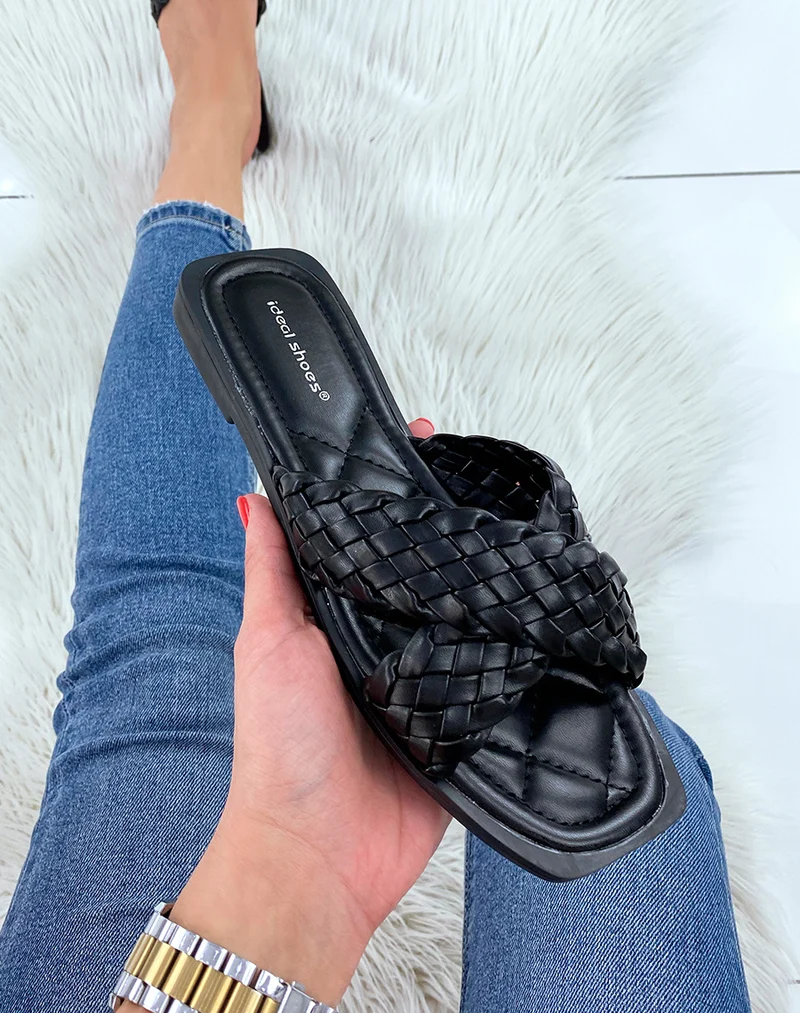 Mules noires à brides croisées et tressées