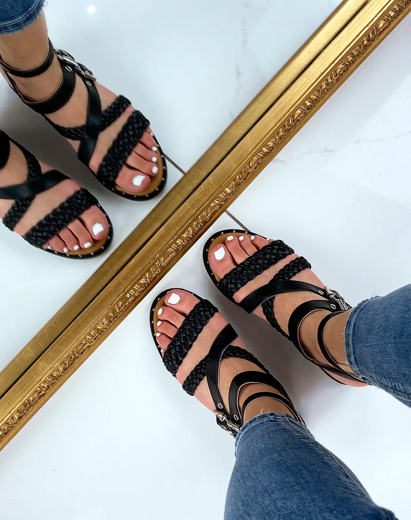 Nu-pieds noirs à multiples brides tressées et lisses
