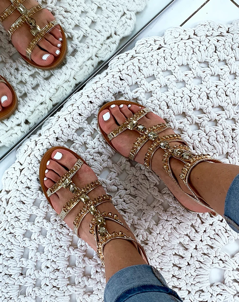 Nu-pieds montantes dorées à bijoux fantaisistes