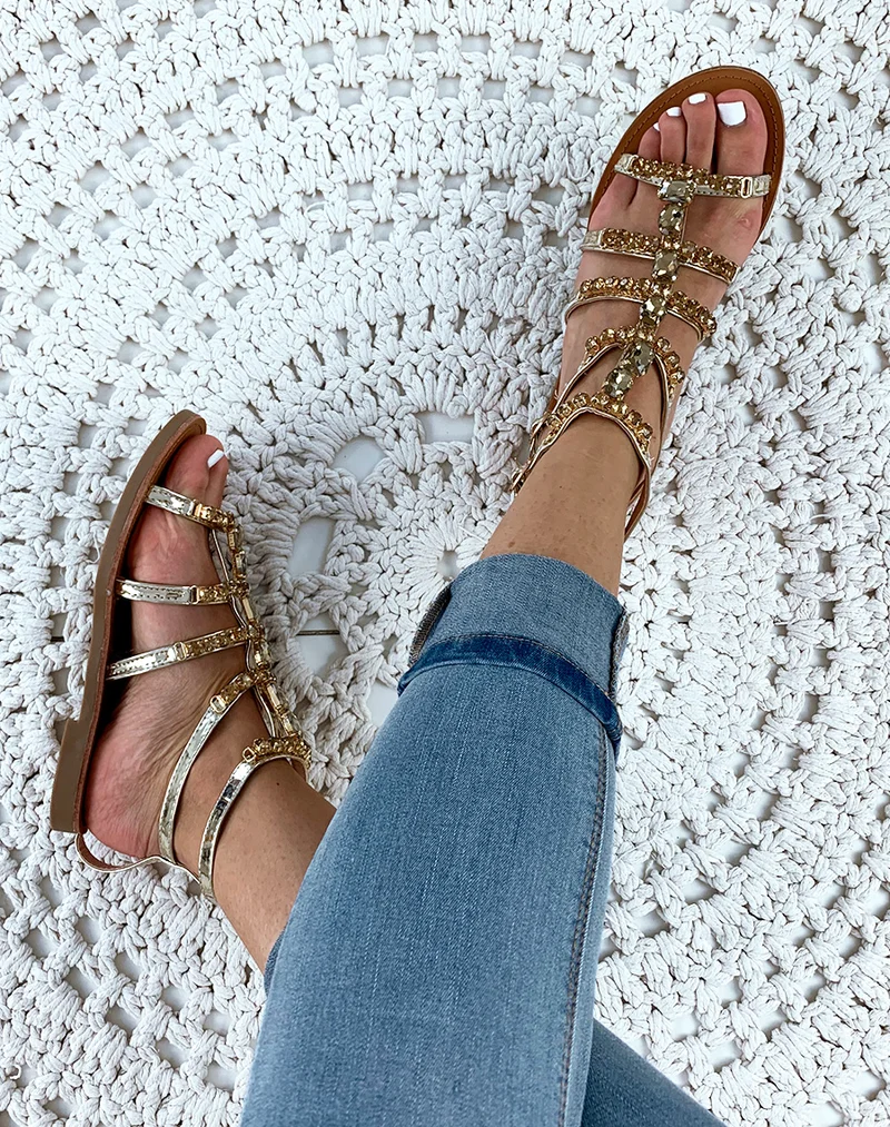 Nu-pieds montantes dorées à bijoux fantaisistes