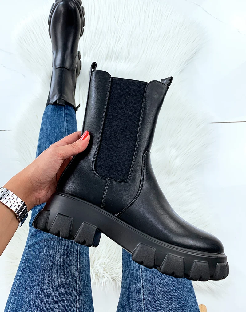 Bottes mi-mollet noires avec semelle crantée épaisse