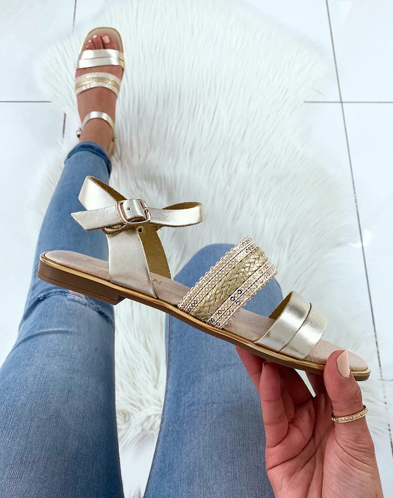 Nu-pied dorée en cuir à bride tressée