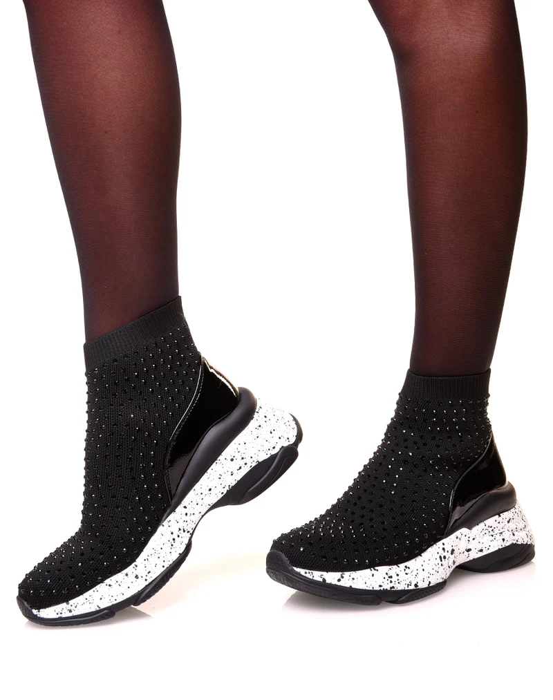Baskets noires en forme de chaussette à semelles tachetées