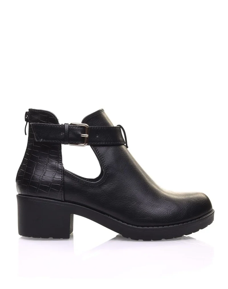 Bottines noires ajourées à petit talon et boucle
