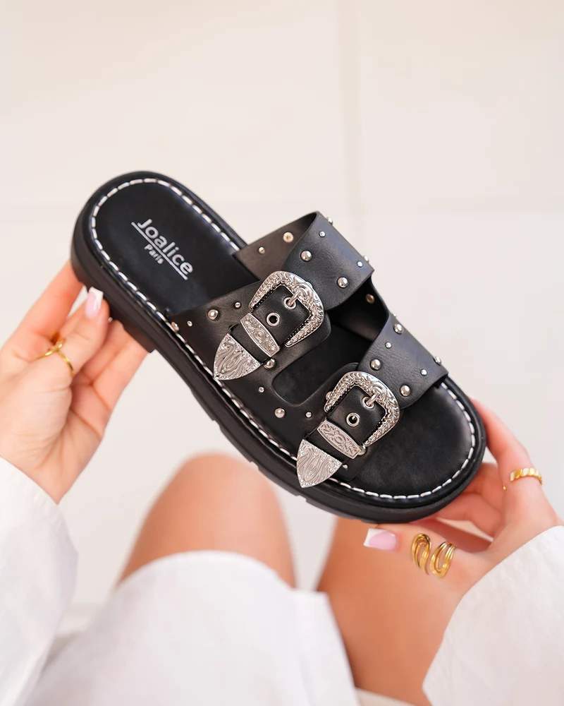 Mules femme noires cloutées avec doubles brides et boucles argentées