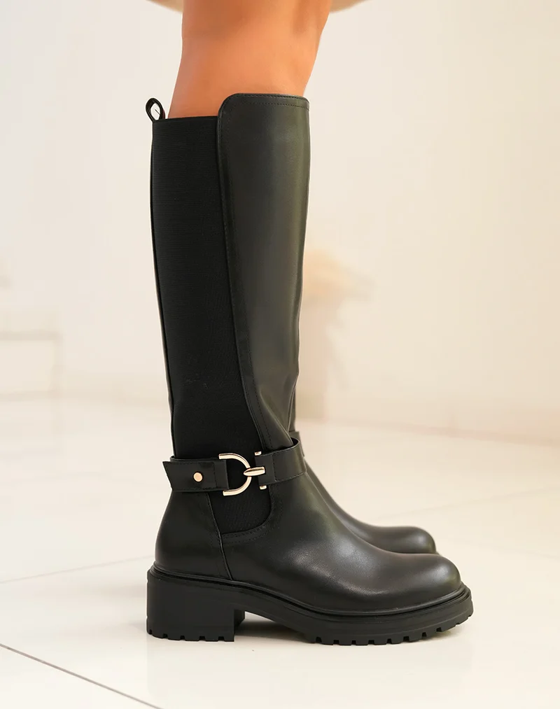 Bottes femme noires hautes avec lanière dorée et semelle crantée