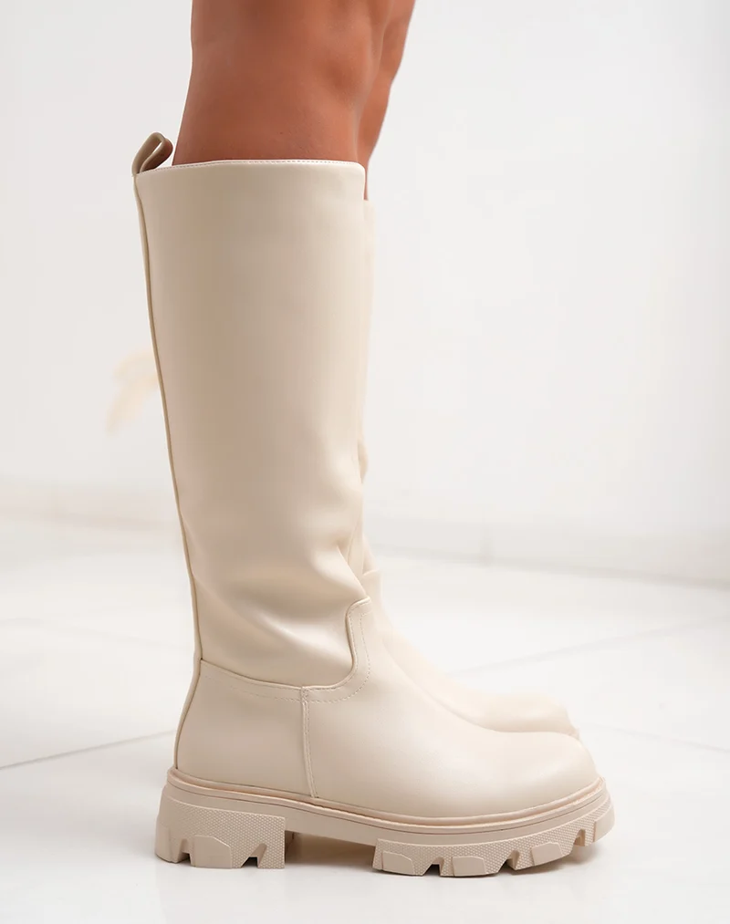 Bottes femme beiges à semelle crantée et intérieur fourré