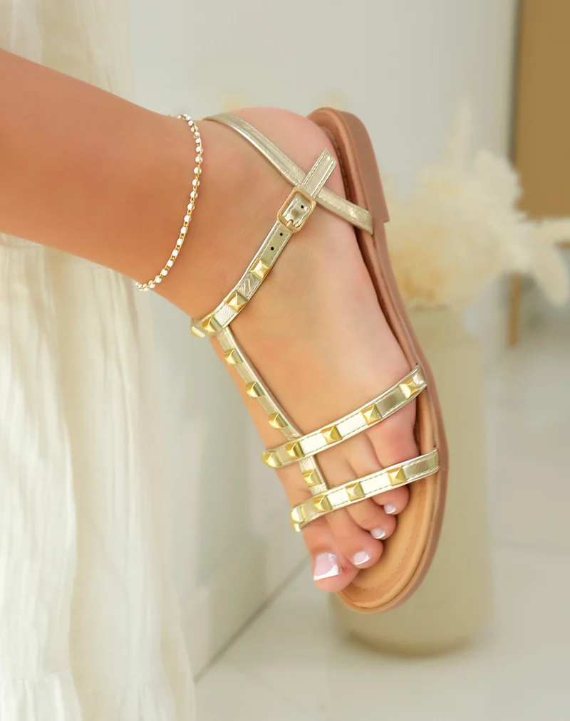 Sandales femme dorées luxueuses avec détails bijoux pour un éclat maximal