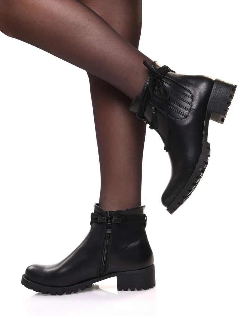 Chelsea boots noires à brides et pompons